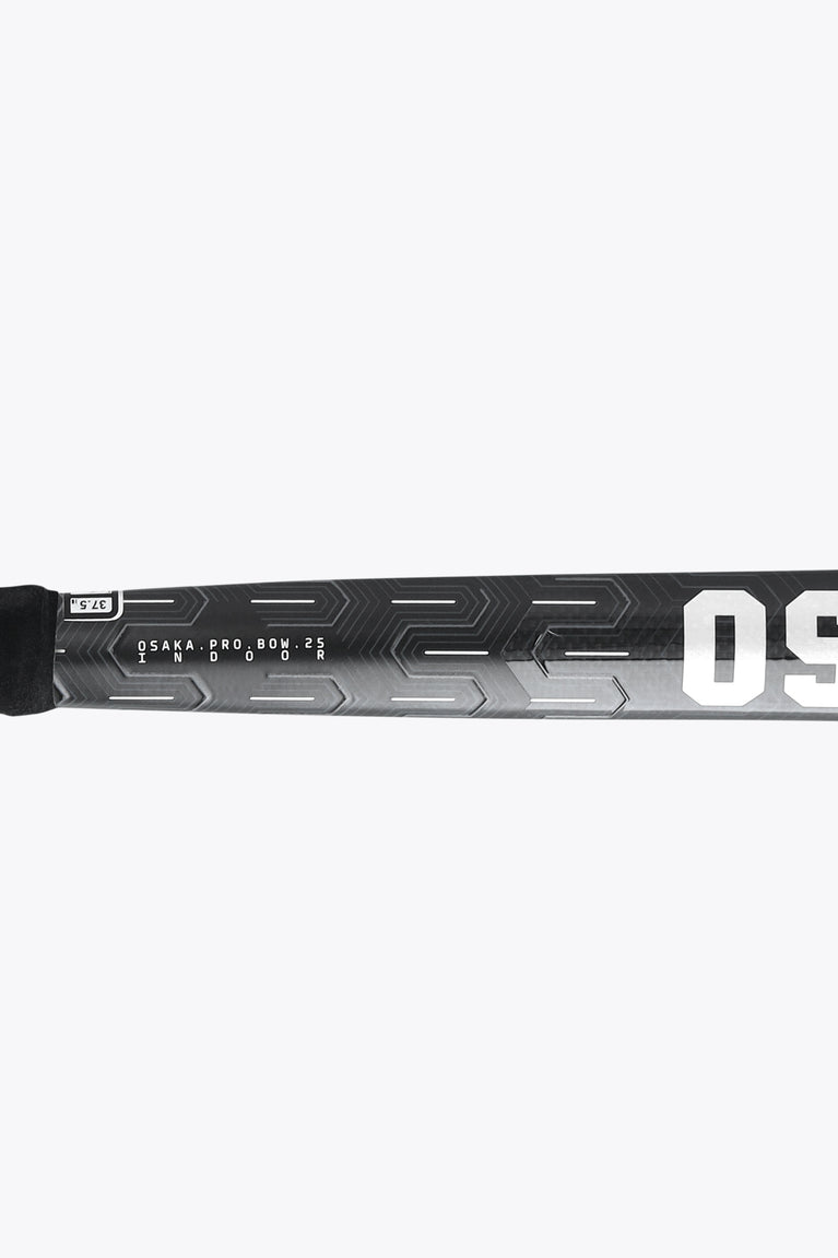 Indoor hockey stick mid-shaft close-up, black with OSAKA PRO text and patterns