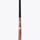Brown field hockey stick with black grip tape and green star decal at the rounded head.