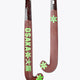 Field hockey stick pair view: dark brown blade with lime star accents and black handle.