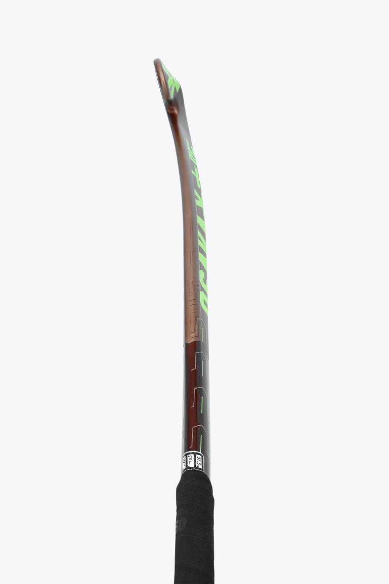 Field hockey stick shaft side view with lime and light graphics and black grip.