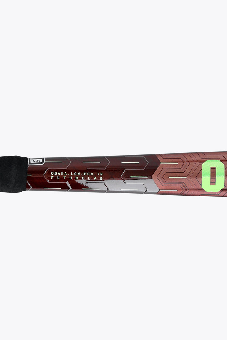 Field hockey stick butt end and shaft graphics; black grip with lime OSAKA marking.