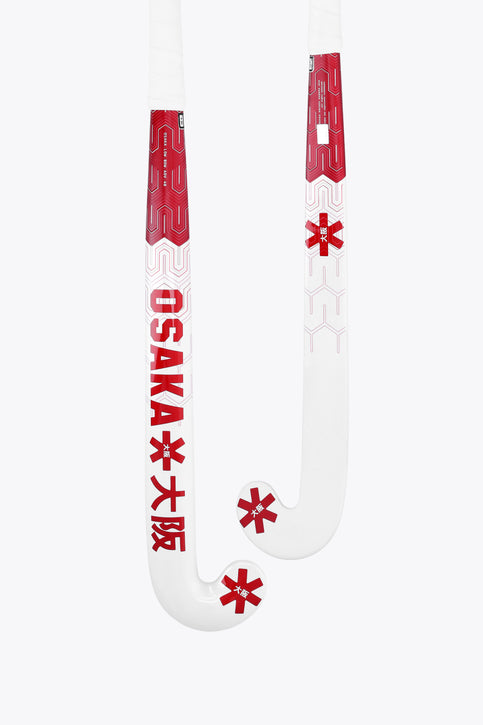Osaka field hockey stick, hot pink and white low-bow curve.