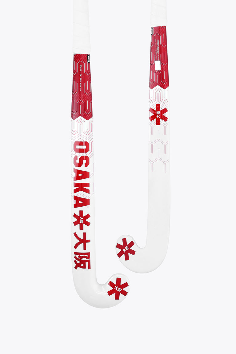 Osaka field hockey stick, hot pink and white low-bow curve.