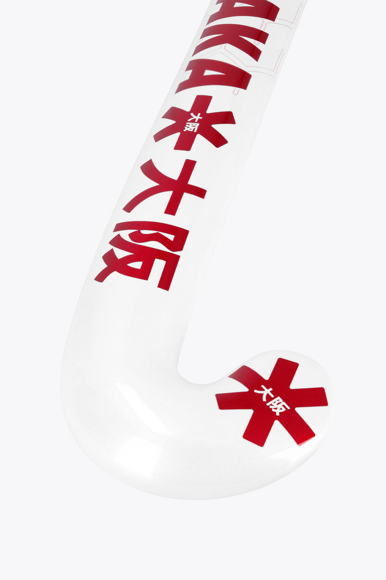 Osaka field hockey stick shaft, hot pink and white with Osaka branding.