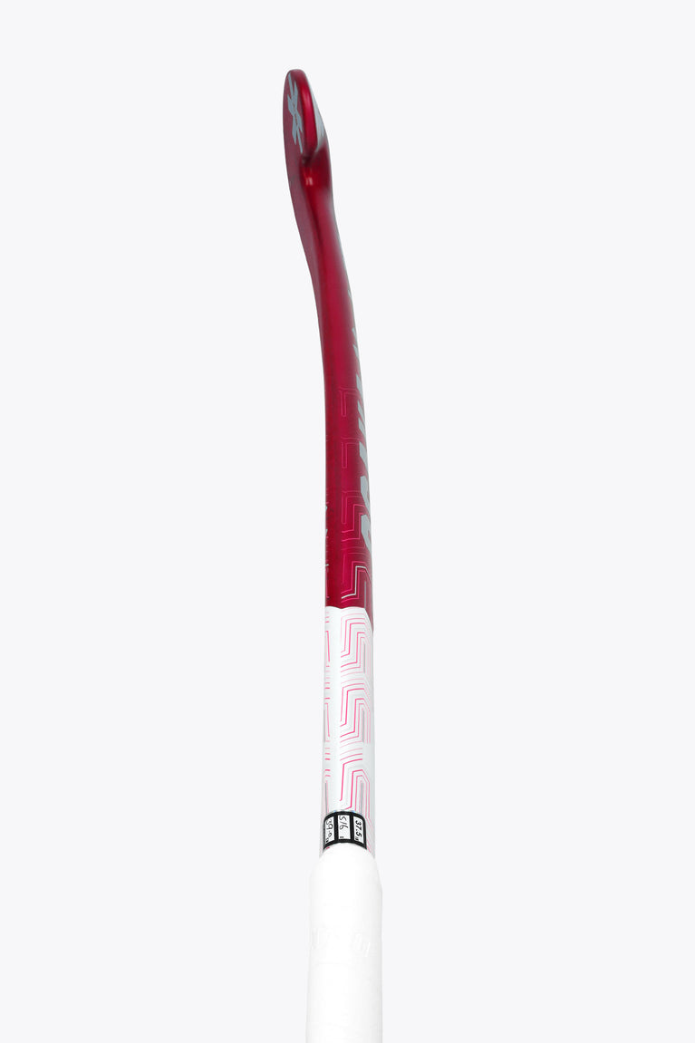 Hot pink field hockey stick shaft with white grip area