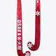 Hot pink field hockey stick with curved blade and white grip at the end