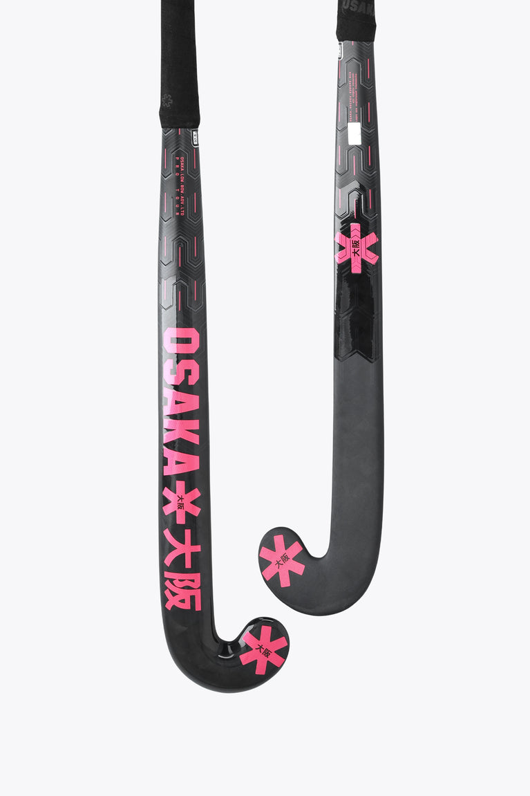 Black field hockey stick with hot pink low-bow head and grip tape