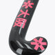 Black field hockey stick head with hot pink star graphics