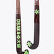 Field hockey stick shaft with OSAKA text and green star graphics, black grip