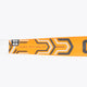 Orange field hockey stick shaft close-up with Osaka Mid Bow WD label