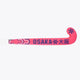 Hot pink field hockey stick showing the full blade with OSAKA text detail