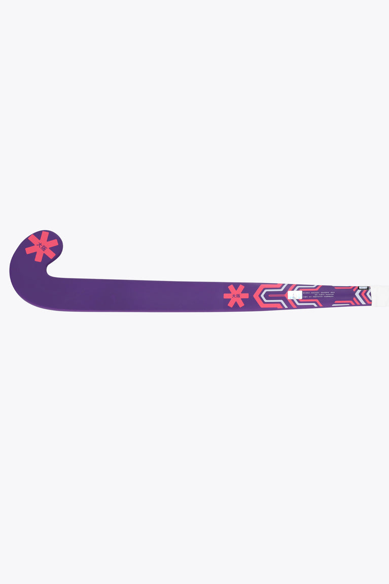 Royal purple hockey stick blade profile with red geometric strip near the head.