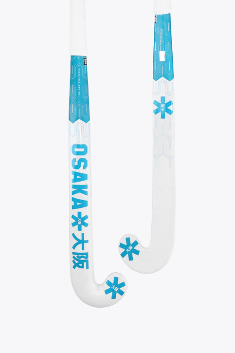 Osaka field hockey stick with white shaft and blue topaz graphics near the head