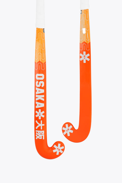 Orange field hockey stick head with Osaka branding and white accent graphics