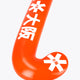 Orange field hockey stick hook end with white Osaka-style graphic text