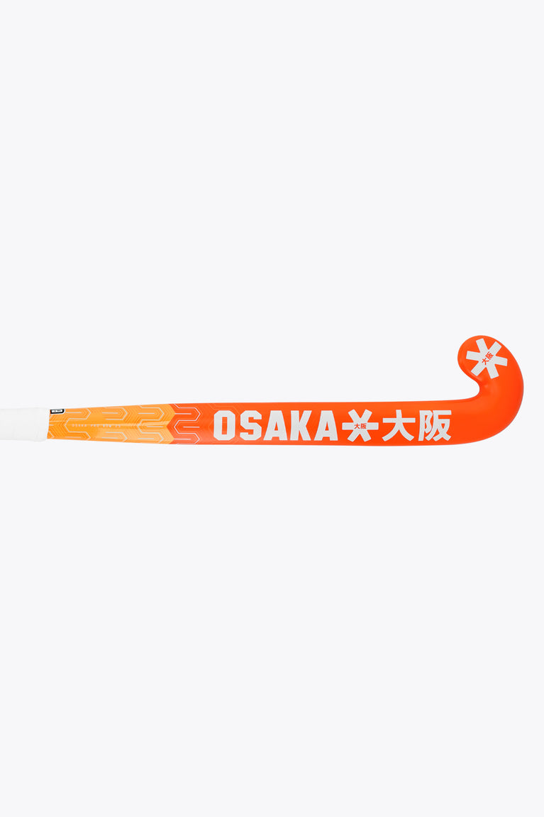 Orange field hockey stick shaft showing Osaka branding in white and gold