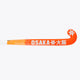 Orange field hockey stick shaft showing Osaka branding in white and gold