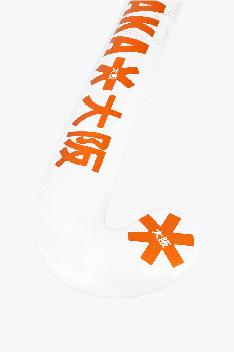 Orange and white field hockey stick blade with Osaka-style branding and star icons