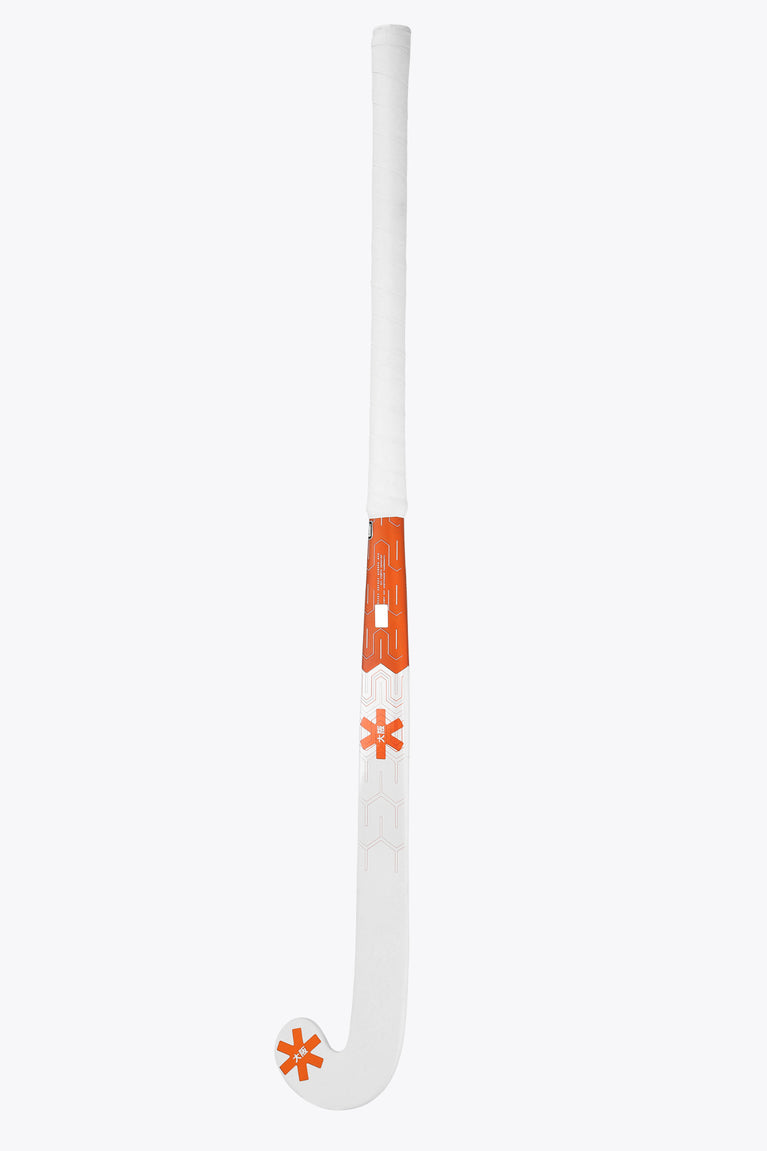 Orange and white field hockey stick with long shaft and small orange branding panel
