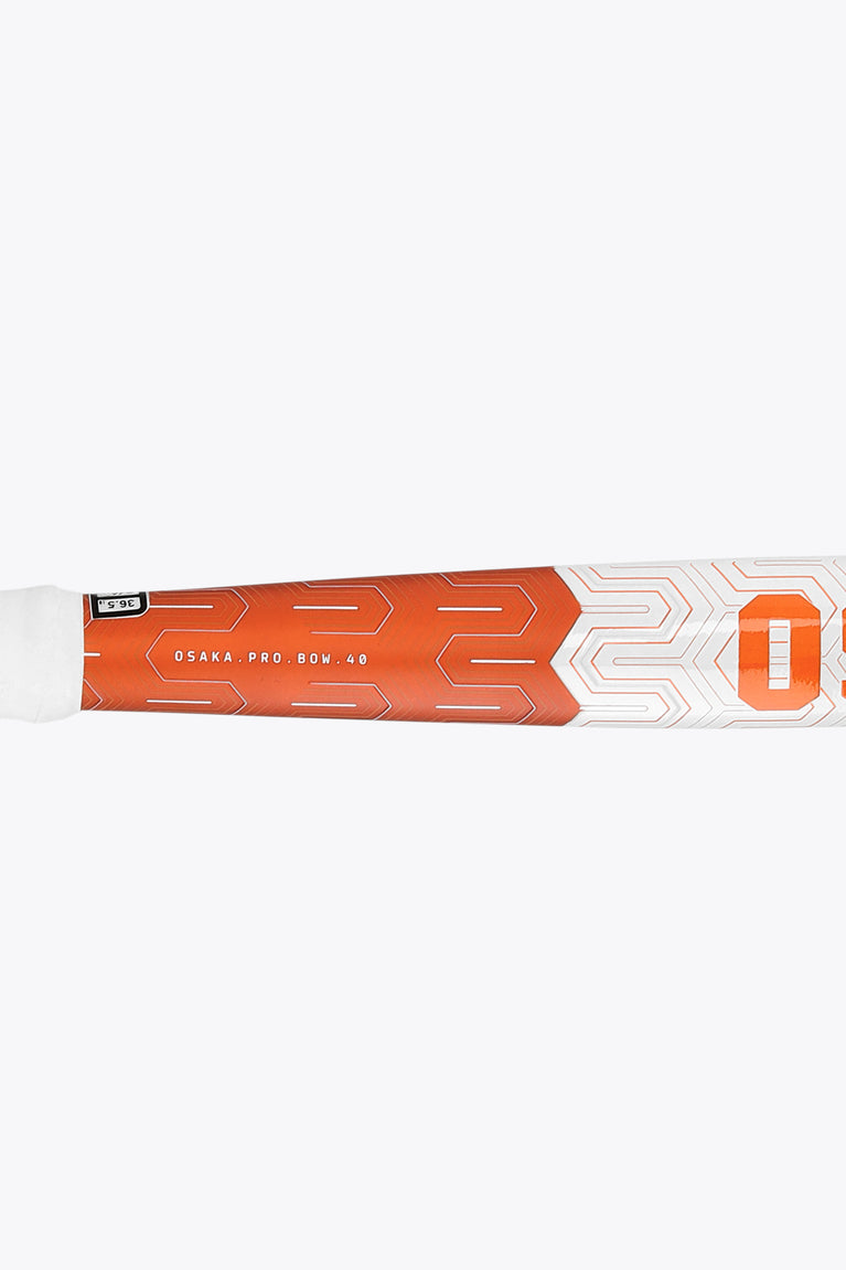 Orange and white field hockey stick shaft with OSAKA PRO BOW 40 print and pattern