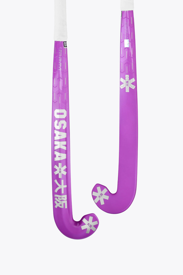 Purple field hockey stick with U-shaped head and Rose Bud branding on shaft