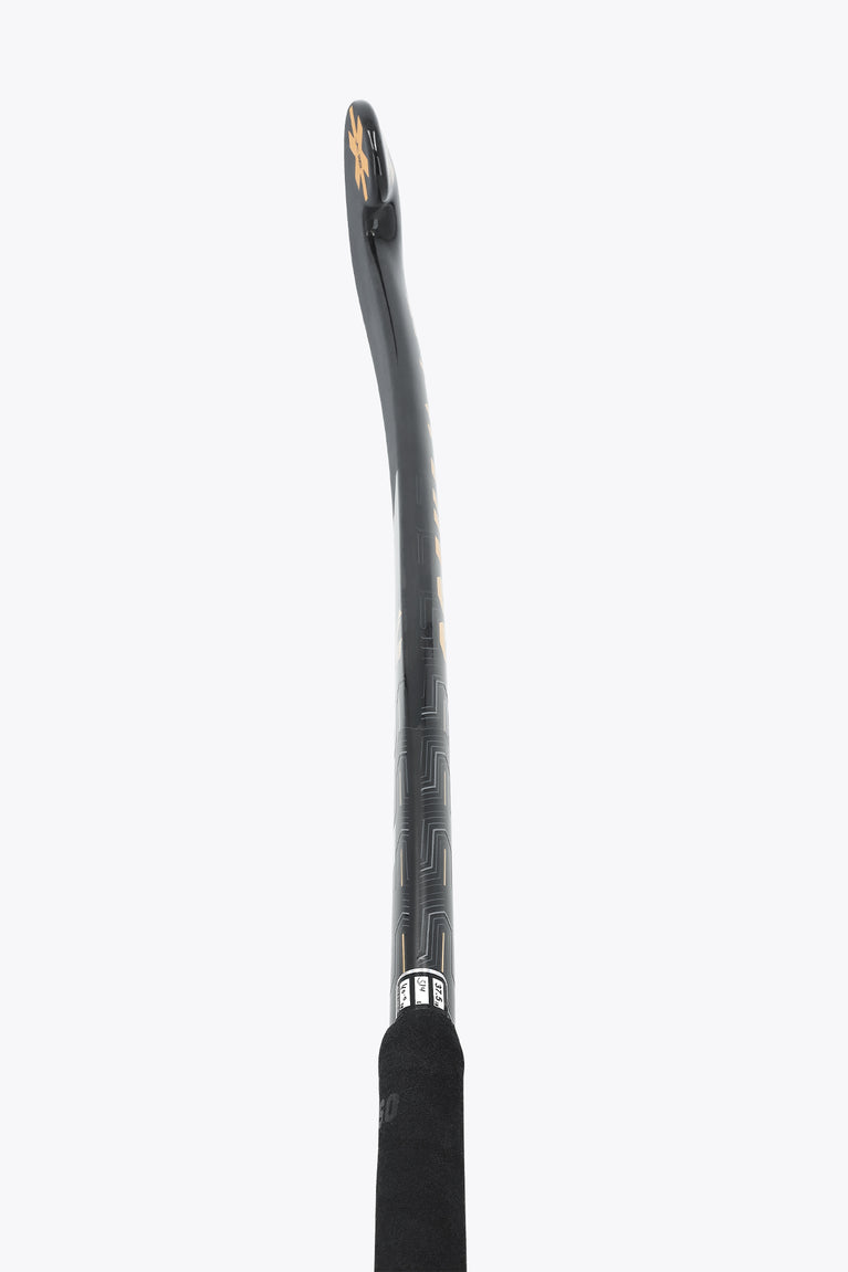 Field hockey stick shaft with dark surface and subtle gray texture