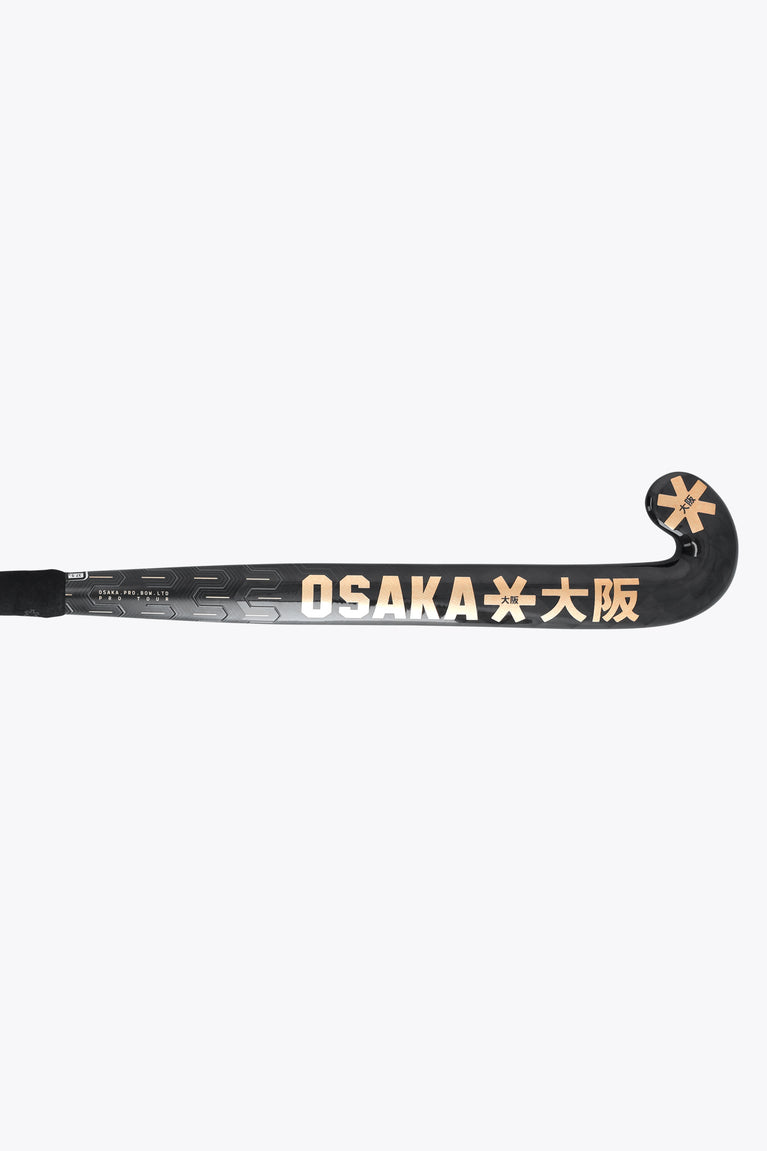 Field hockey stick grip end with gold Osaka text and star emblem