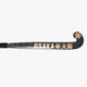 Field hockey stick grip end with gold Osaka text and star emblem
