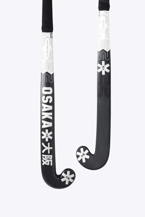 Field hockey stick blade with Osaka text and star logo on white and black
