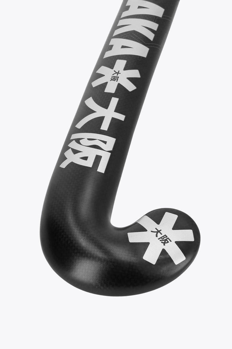 Field hockey stick blade with Osaka lettering and star logo, close-up