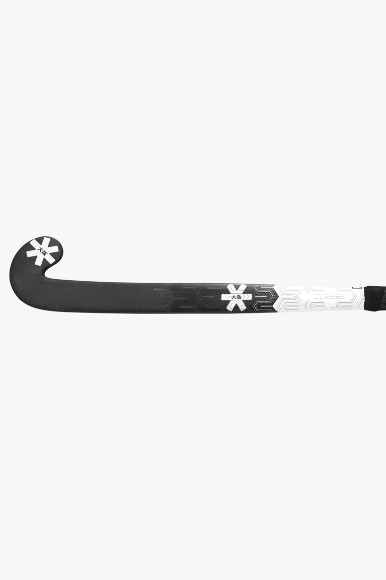 Field hockey stick with black blade and patterned white shaft, side view
