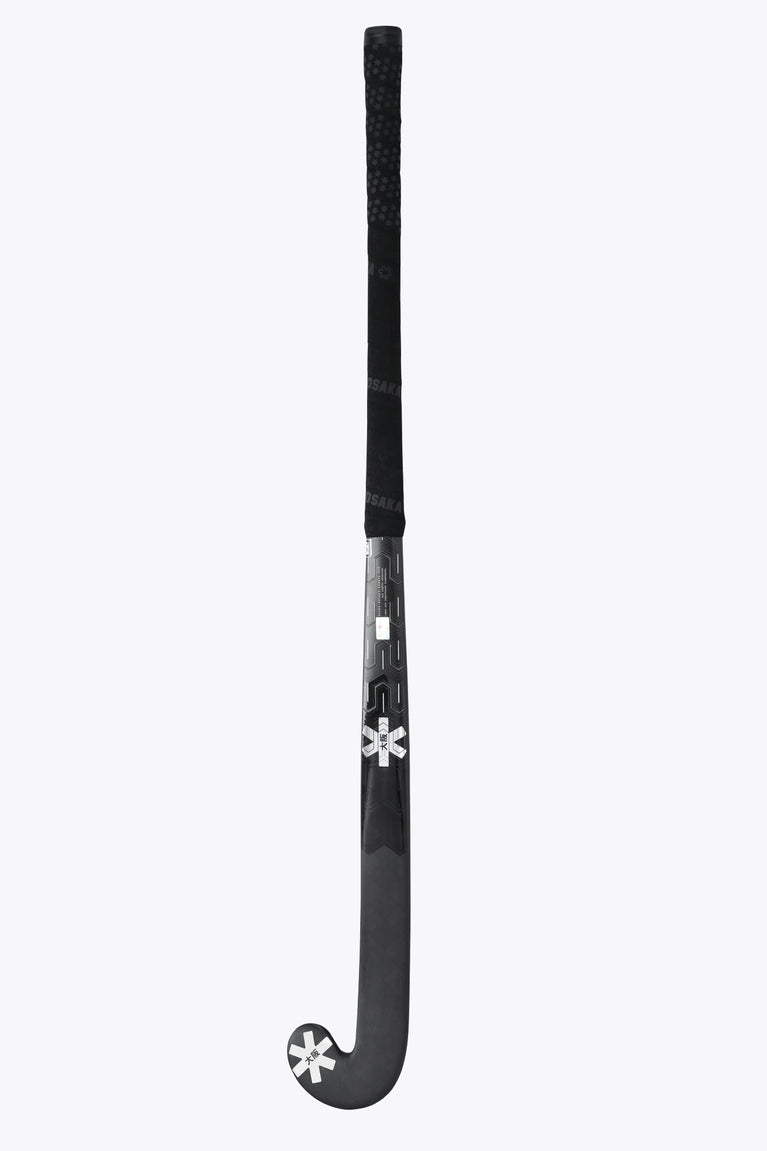 Field hockey stick head and neck, black blade with star emblem and silver trim near grip