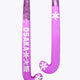 Purple low-bow field hockey stick head with rose bud graphics and white shaft.