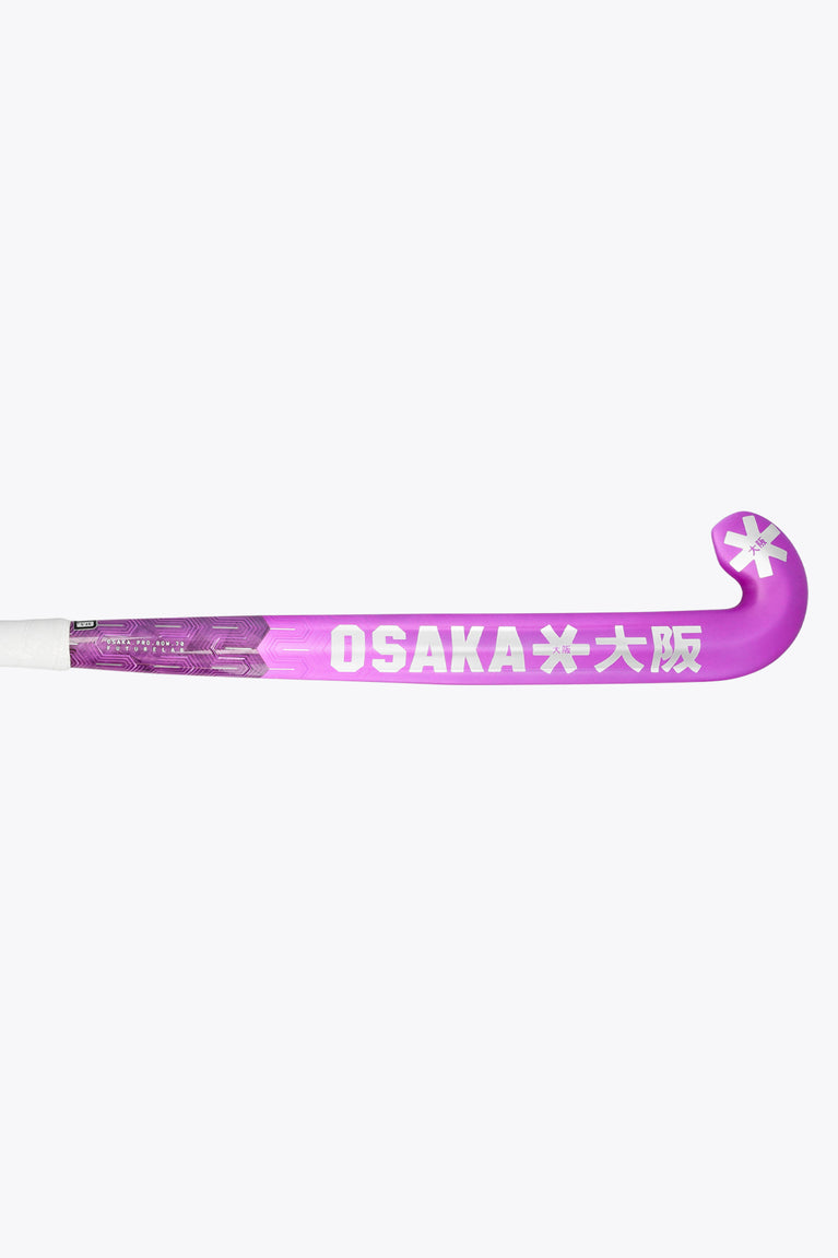 Rose bud field hockey stick, low-bow head and purple shaft with white grip.