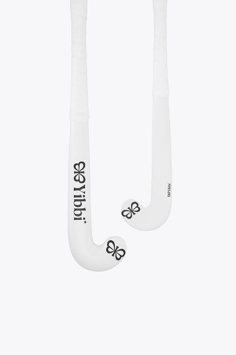 White Yibbi mini stick with black clover logo on curved blade