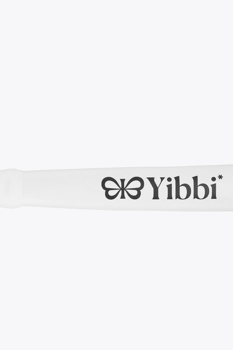 White mini stick with Yibbi branding across shaft and clover logo
