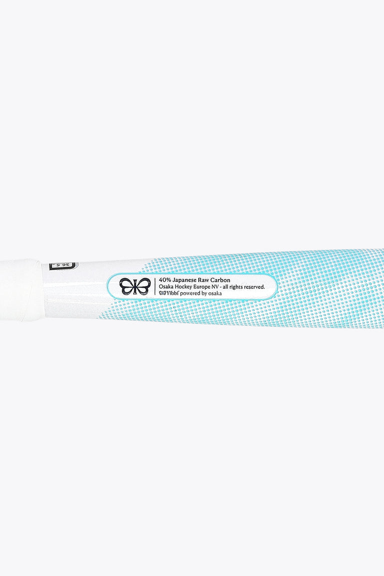 Yibbi field hockey stick with light blue grip strip and printed details on the shaft