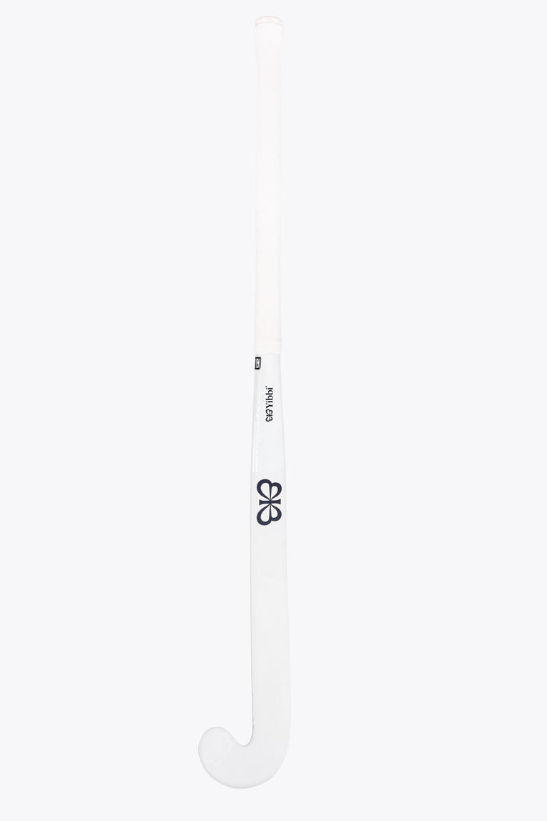 Field hockey stick shaft close-up, white with black flower logo and small print