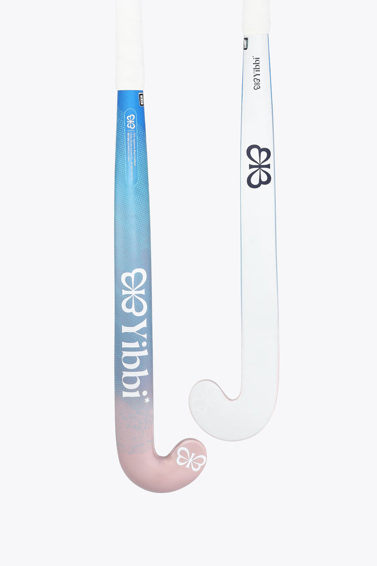 Field hockey stick with blue shaft, pastel pink curved head, and white blade face.