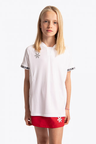 Girl wearing the Osaka Kids Jersey in white. Front view