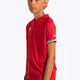 Boy wearing the Osaka Kids Jersey in Red. Side view