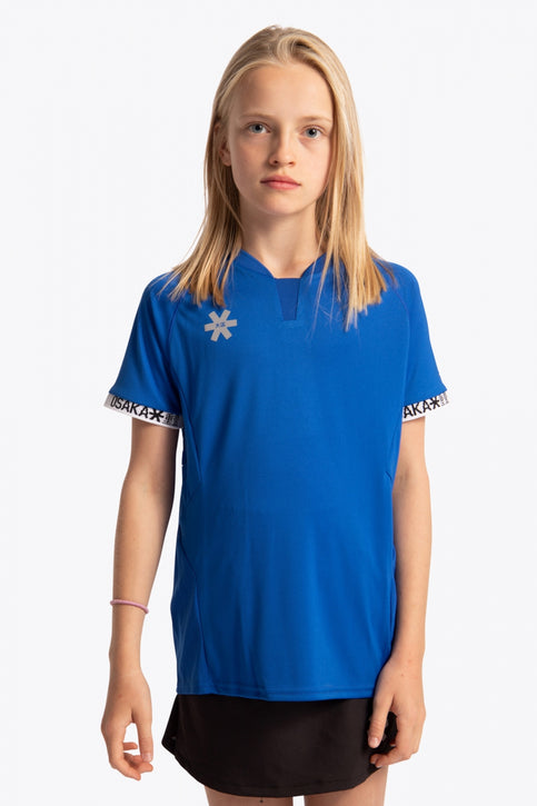Girl wearing the Osaka Kids Jersey in Royal blue. Front view