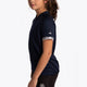 Girl wearing the Osaka Kids Jersey in Navy. Side view