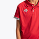 Boy wearing the Osaka Kids Polo Jersey in Red. Front detail logo view