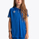 Girl wearing the Osaka Kids Polo Jersey in Royal blue. Front view