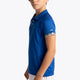 Boy wearing the Osaka Kids Polo Jersey in Royal blue. Side view