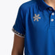 Boy wearing the Osaka Kids Polo Jersey in Royal blue. Front detail logo view