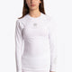 Girl wearing the Osaka Kids Baselayer Top in white. Front view