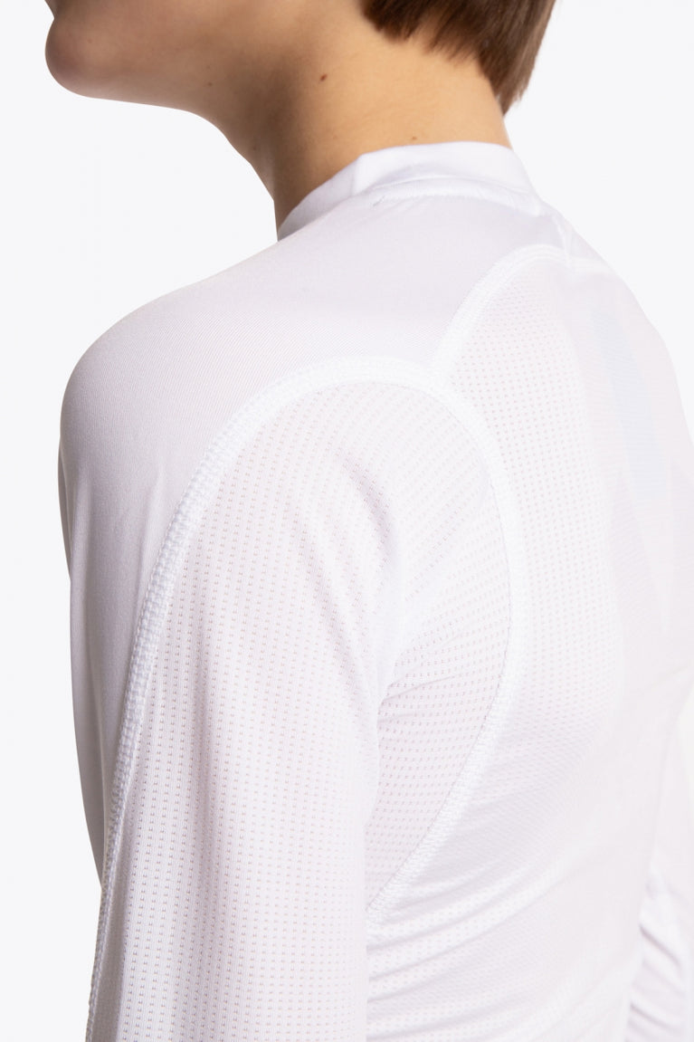 Boy wearing the Osaka Kids Baselayer Top in white. Back detail sleeve view