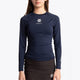  Girl wearing the Osaka Kids Baselayer Top in Navy. Front view